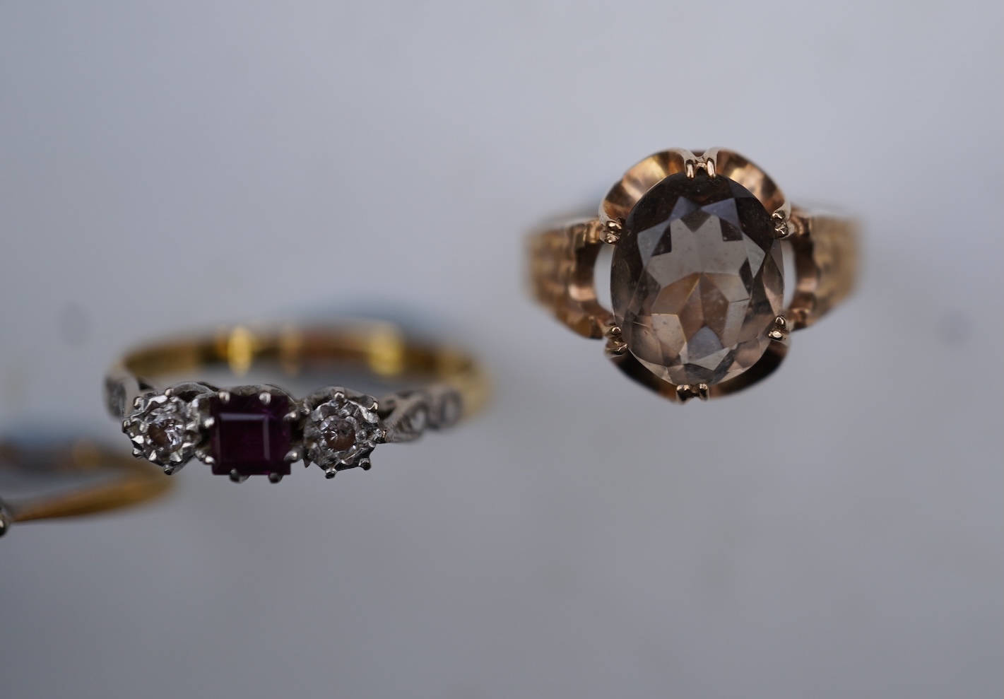 Four gem-set rings